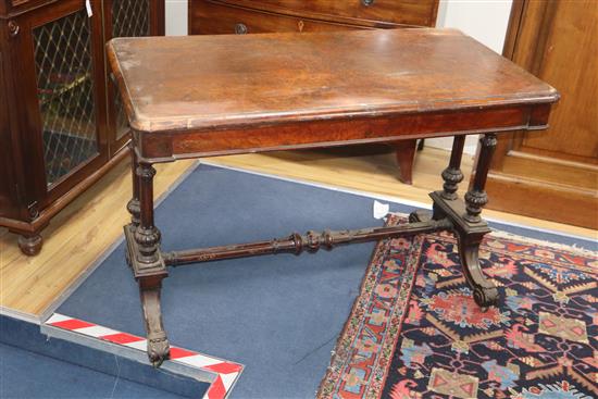 A Victorian burr walnut two drawer library table W.114cm